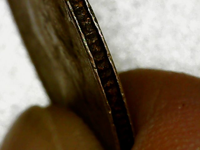 Bizarre-1992-D-Quarter---Maybe-Not-Just-Dirty-And-Damaged?